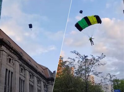 Basejumpers springen vanaf 155 meter hoog gebouw naar beneden en landen op Coolsingel