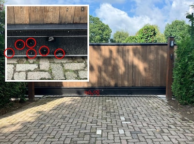 Na beschieten huis in Overasselt stapt jongeman met AK-47 uit auto: ‘Wilde niet op de agenten richte