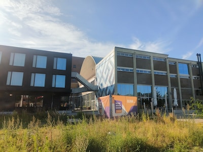 Regen in Enschede? In dit nieuwe appartementencomplex zit je tóch lekker ‘buiten’