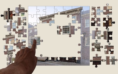 Schuif de puzzelstukjes en ontdek een heel oud Haags pand