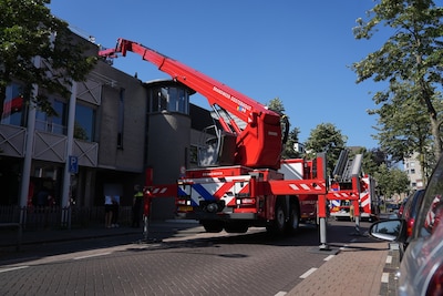 Brand door kortsluiting in wasmachine of droger, brandweer komt met twee bluswagens naar Oosterhout