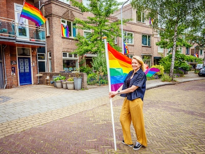'Don't touch that sweet boy': Entire street flies rainbow flags after threat to 11-year-old