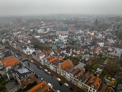 Informatie over bodemdaling tijdens wandeling door centrum Gouda