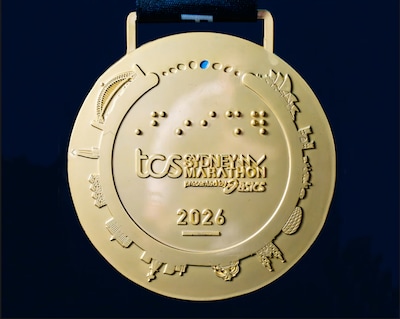 Opmerkelijk foutje: stadion Bayern München als ‘bezienswaardigheid’ op medaille marathon Sydney