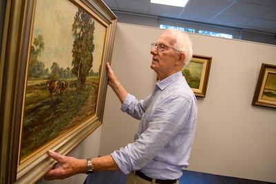 Content with an easel and a drink, that's how Pierre Wolfs painted his way through life