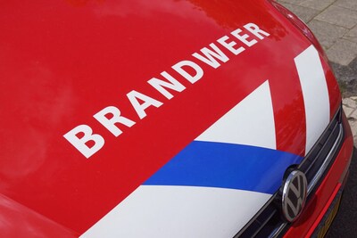 Grote uitslaande brand in portiekwoning Rotterdam