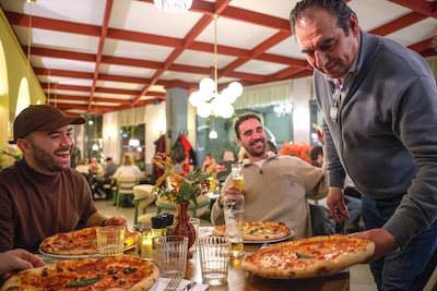 Uit een Bredaas steegje stijgt Italiaanse warmte op