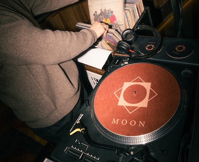 Spinning records, spinning restaurant: dining with live vinyl music above Amsterdam