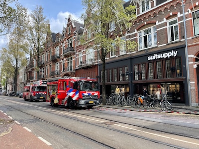 Sein brand meester gegeven bij brand bij kledingwinkel Suitsupply in Amsterdam-Zuid