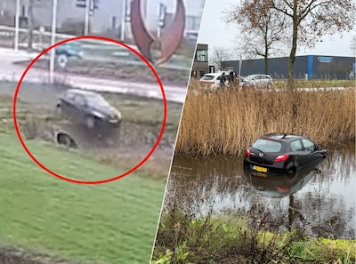 Beelden laten zien hoe vrouw met auto over rotonde vliegt in Nijverdal en in water belandt