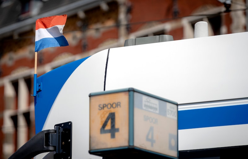 All trams in Amsterdam carry flags during King's Day.