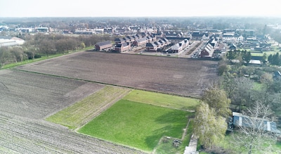 Bouwplan Bernheze botst met boer: nieuwe wijk komt zo dicht bij akker dat spuiten straks verboden is