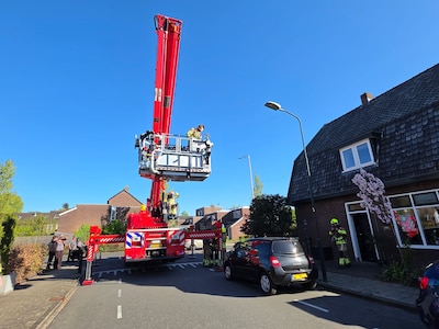 Schoorsteenbrand in Renkum, brandweer grijpt in