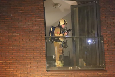 Vlam in de pan in Veenendaal: bewoonster en katten gered uit appartement