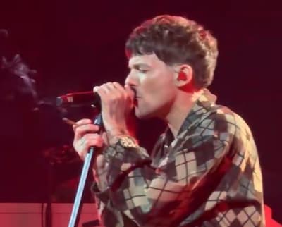 Ziggo Dome reprimands Louis Tomlinson after singer smokes joint on stage