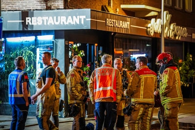 Brand in keuken van restaurant in Eindhoven: woningen boven pand ontruimd