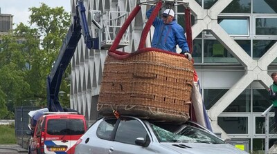 Luchtballon met man erin belandt op autodak: wie goed kijkt ziet direct wat er niet klopt