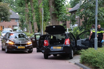 Auto klemgereden door politie in Ede