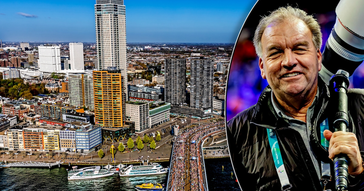 Onze fotograaf Pim Ras klom op de Erasmusbrug voor Rotterdam Marathon ...