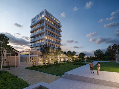 Nieuwe toren Rise verrijst tussen historische fabriekshallen in Eindhovense buurt