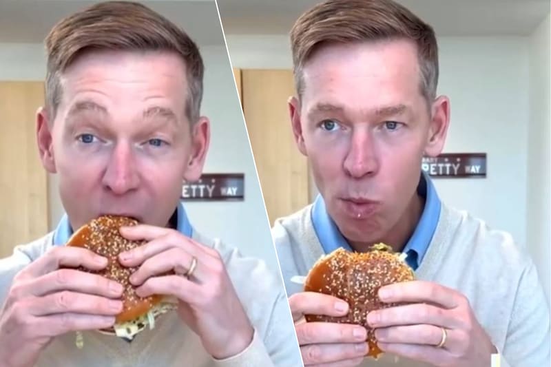 McDonald’s-CEO Chris Kempczinski tijdens een ongemakkelijke eerste hap van de nieuwe Big Arch Burger.
