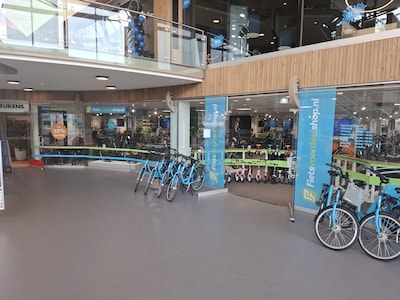 Fietswinkel mag tóch in Woonhart blijven, na jarenlange strijd met provincie