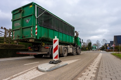DHL volgt Choi Kwai: voortaan geen vrachtwagens meer door kern Huissen