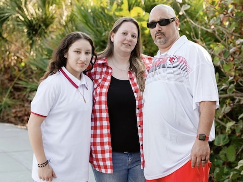 Owen Ramsingh, die is opgepakt door de Amerikaanse vreemdelingenpolitie, met zijn vrouw en dochter.